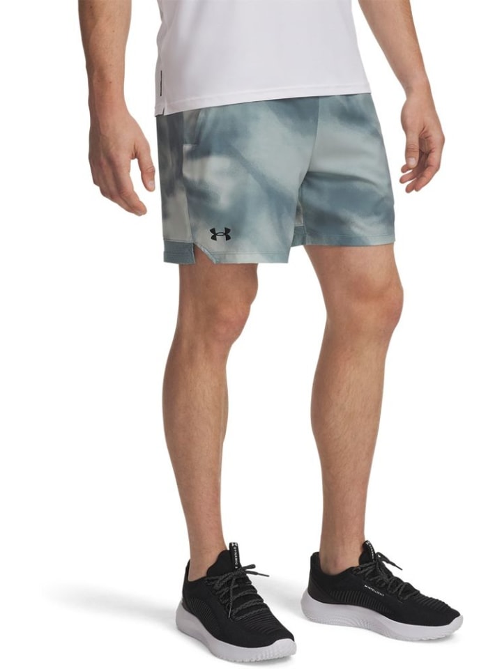 

Спортивные шорты "Vanish Woven 6In Prnt Sts" зеленого цвета Under Armour