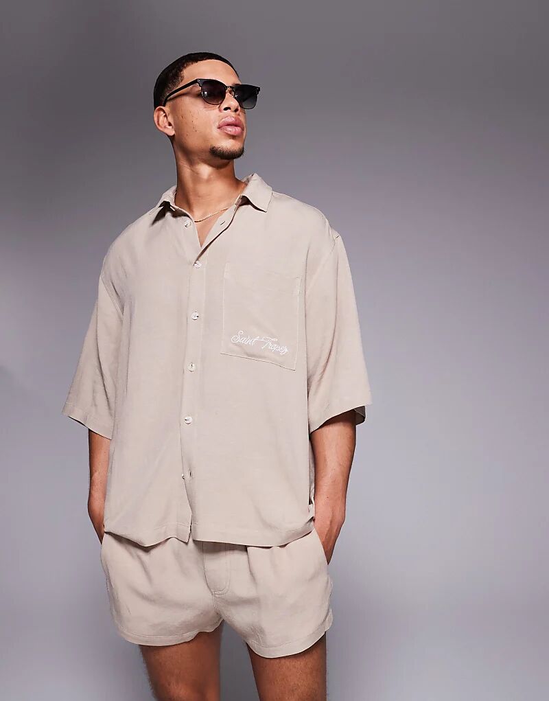 

Рубашка свободного кроя из льняной смеси ASOS DESIGN коричневого цвета с вышивкой на груди
