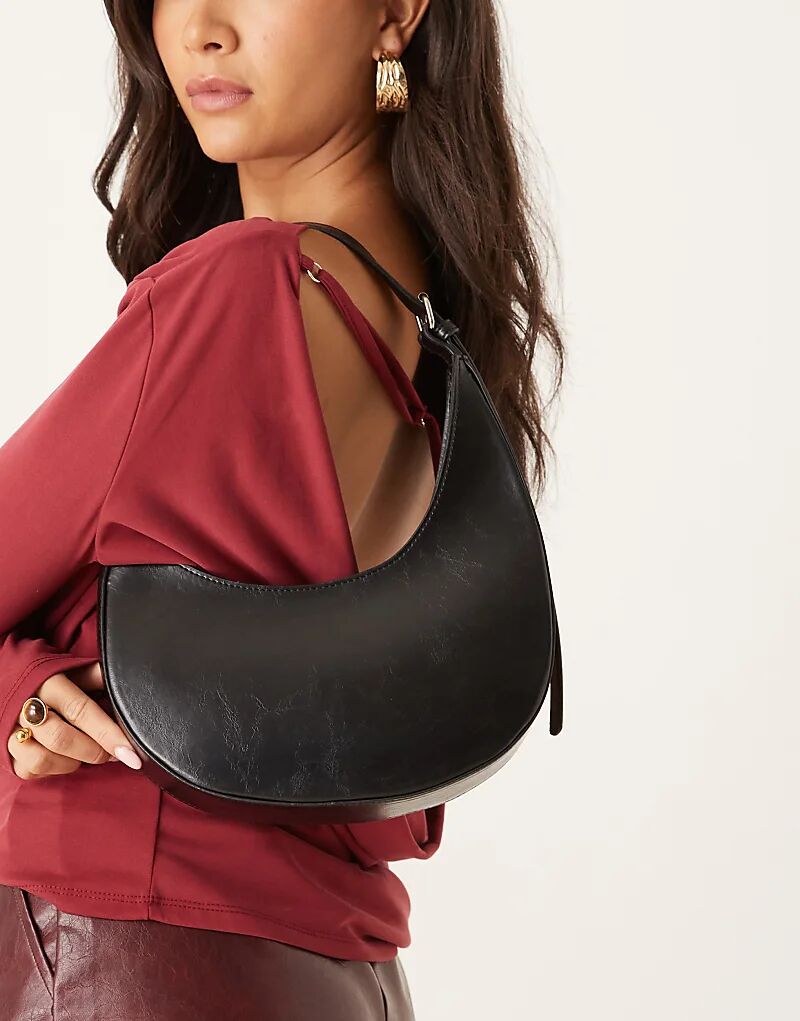 

Сумка через плечо ASOS DESIGN асимметричного овального кроя с пряжкой черного цвета