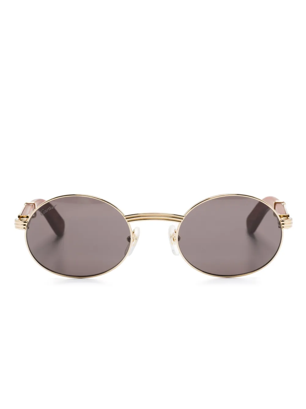 

Солнцезащитные очки в овальной оправе Cartier Eyewear, золотой