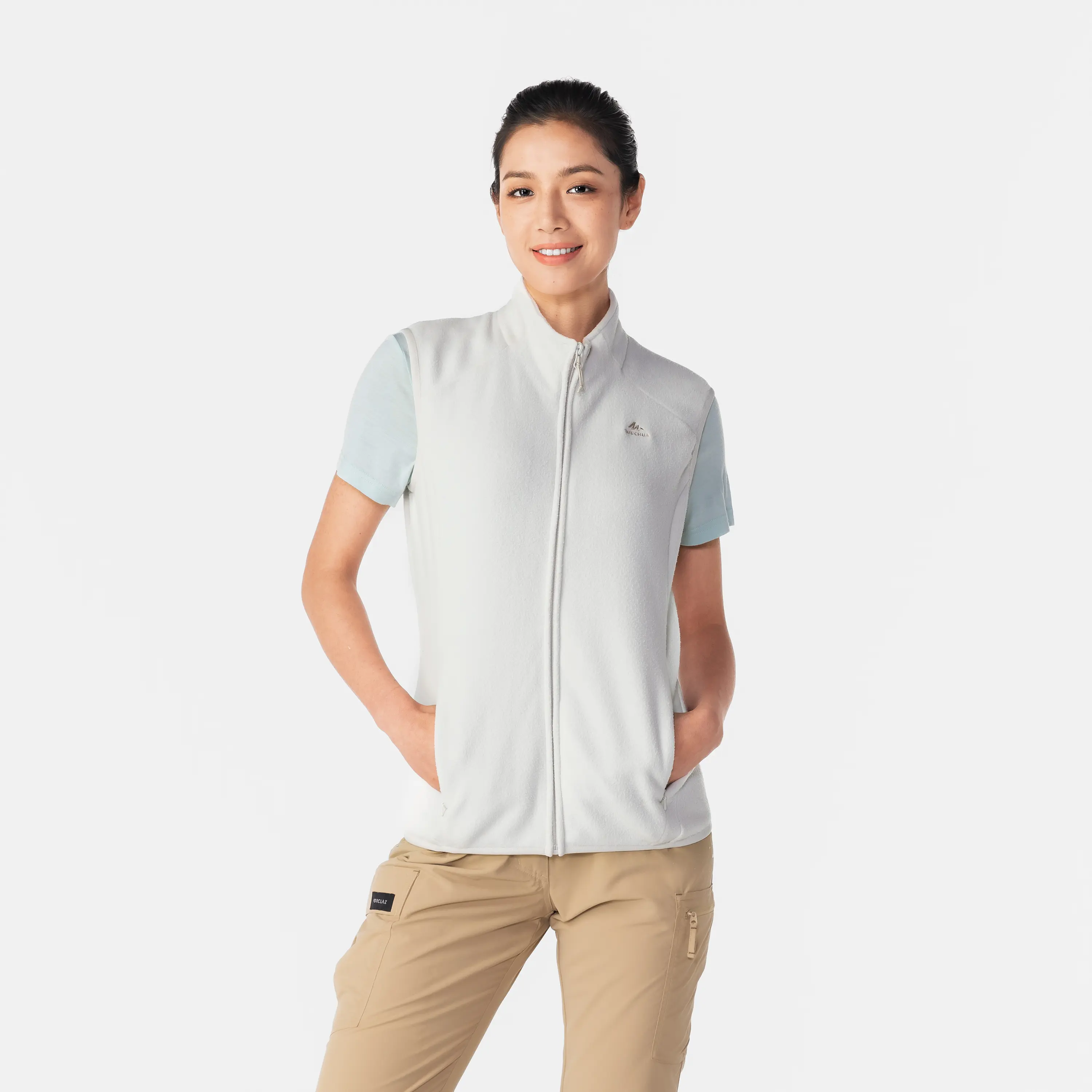 

Женская флисовая жилетка для горных походов Quechua MH100 бежевая