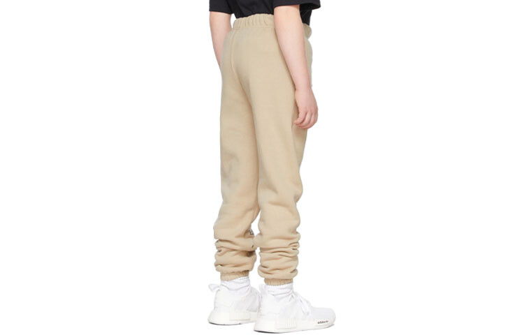 Детские трикотажные спортивные штаны Fear Of God Essentials, бежевый — фото 2