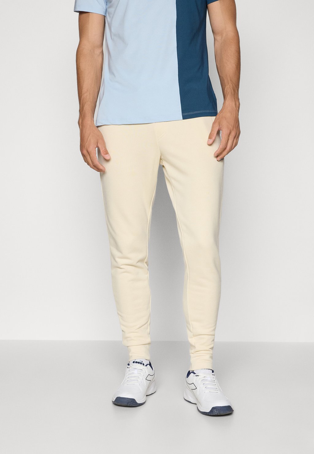 

Спортивные штаны ESSENTIAL SWEATPANTS Björn Borg, кремовый