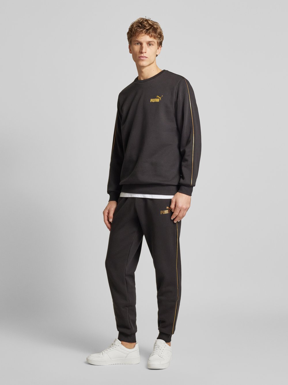 

Свободные спортивные брюки с этикеткой PUMA PERFORMANCE, черный