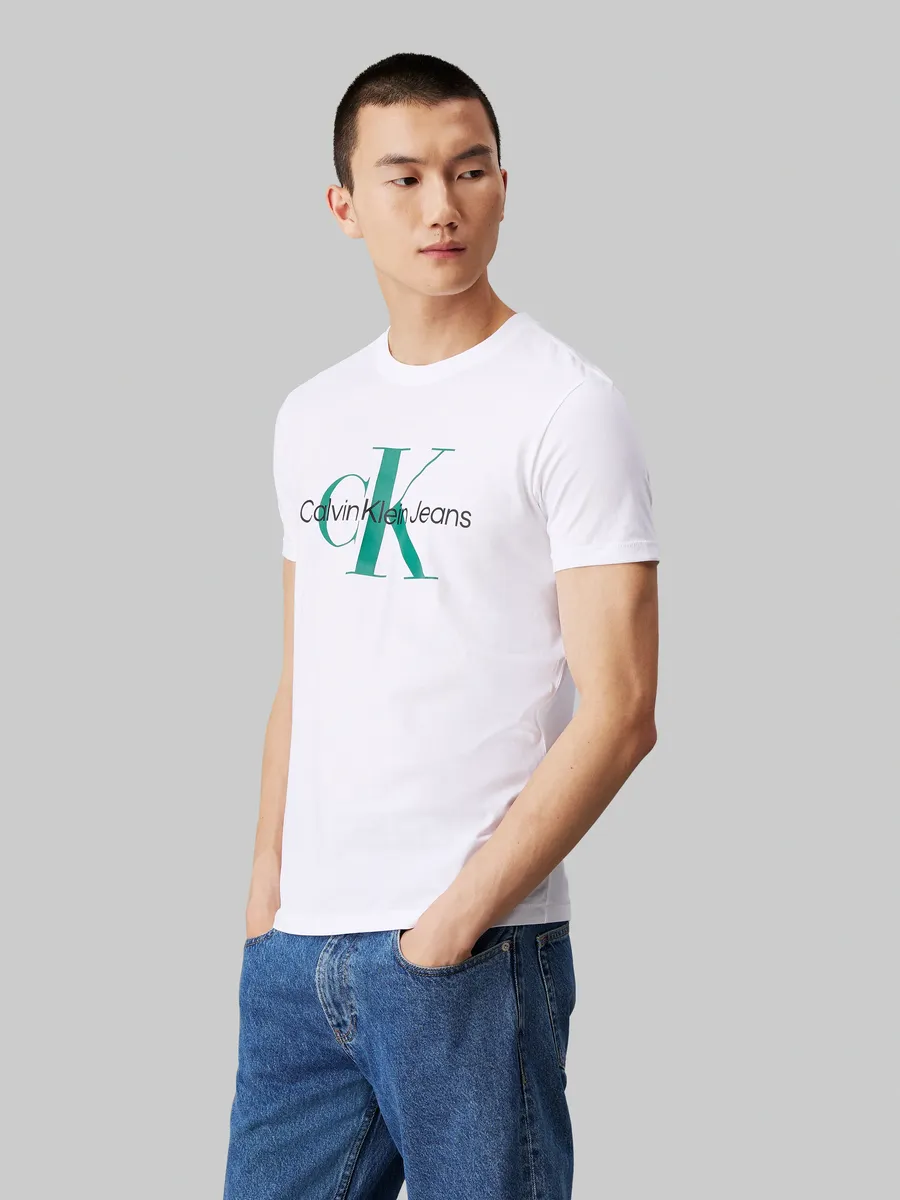 

Футболка Calvin Klein Jeans "SEASONAL MONOLOGO TEE" с крупным принтом-логотипом, белый