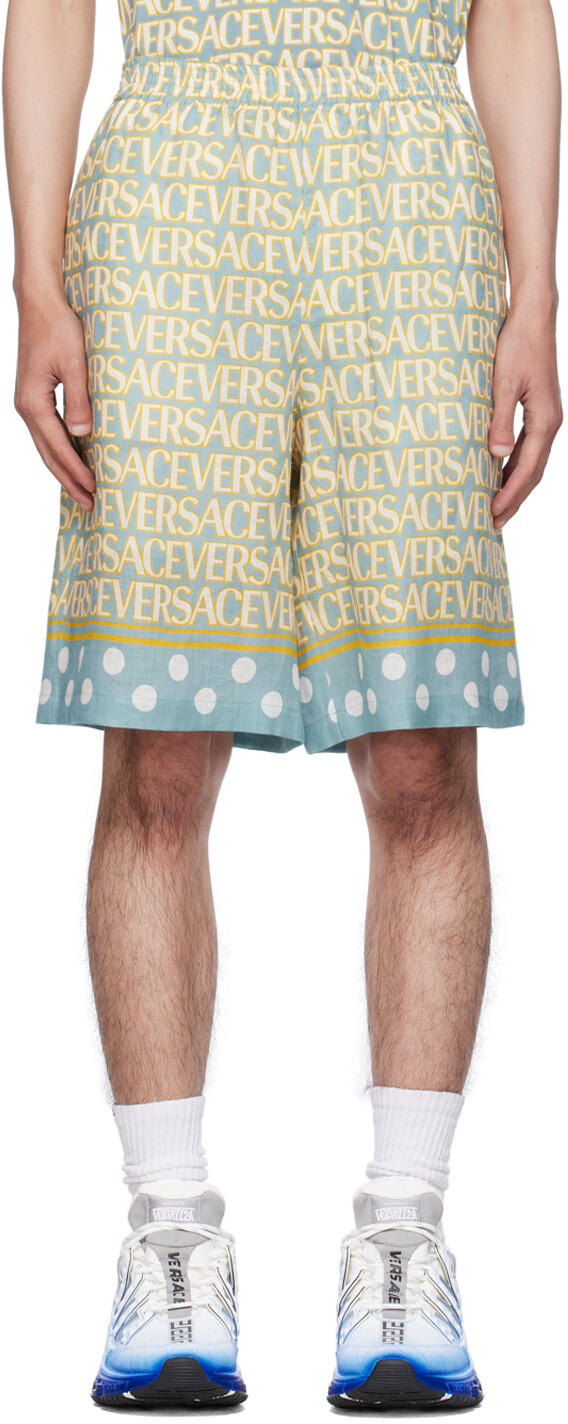 

Синие и желтые шорты по всей длине Versace