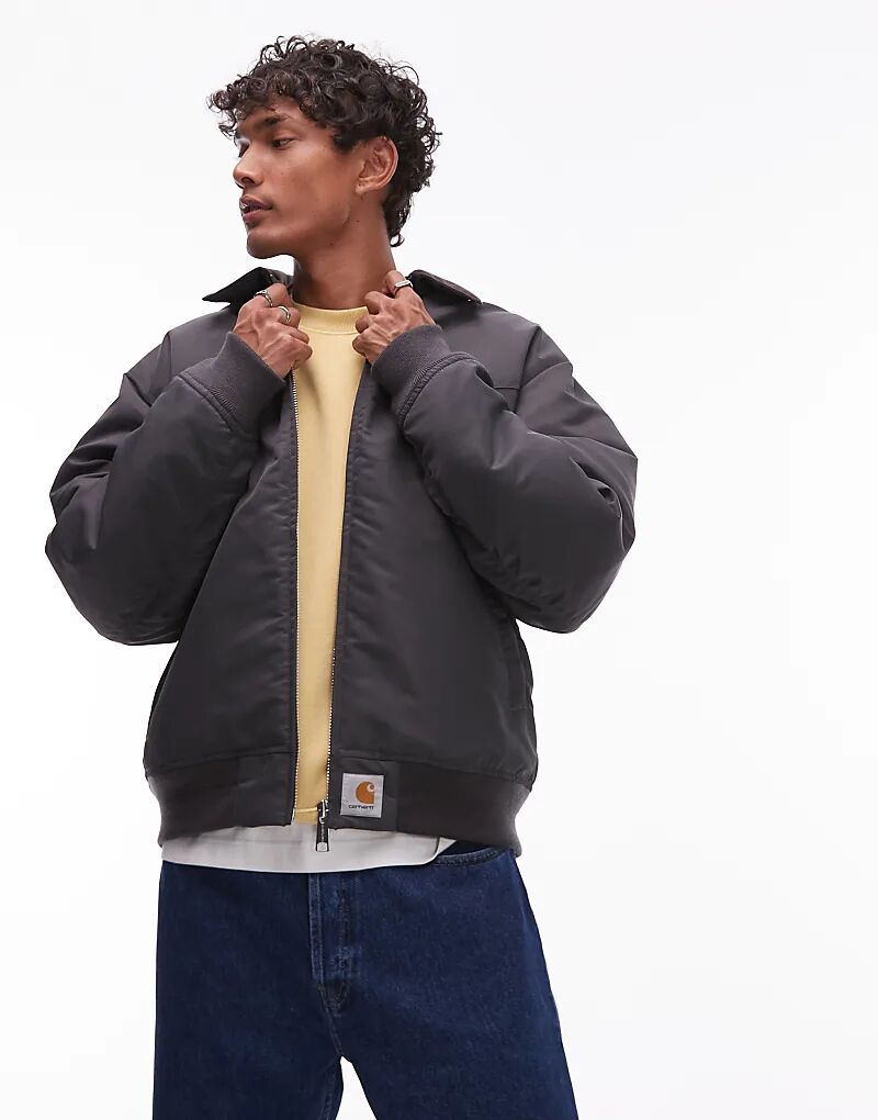 

Стеганая куртка-молния Carhartt WIP Sante Fe Alumni серого цвета, Серый, Стеганая куртка-молния Carhartt WIP Sante Fe Alumni серого цвета