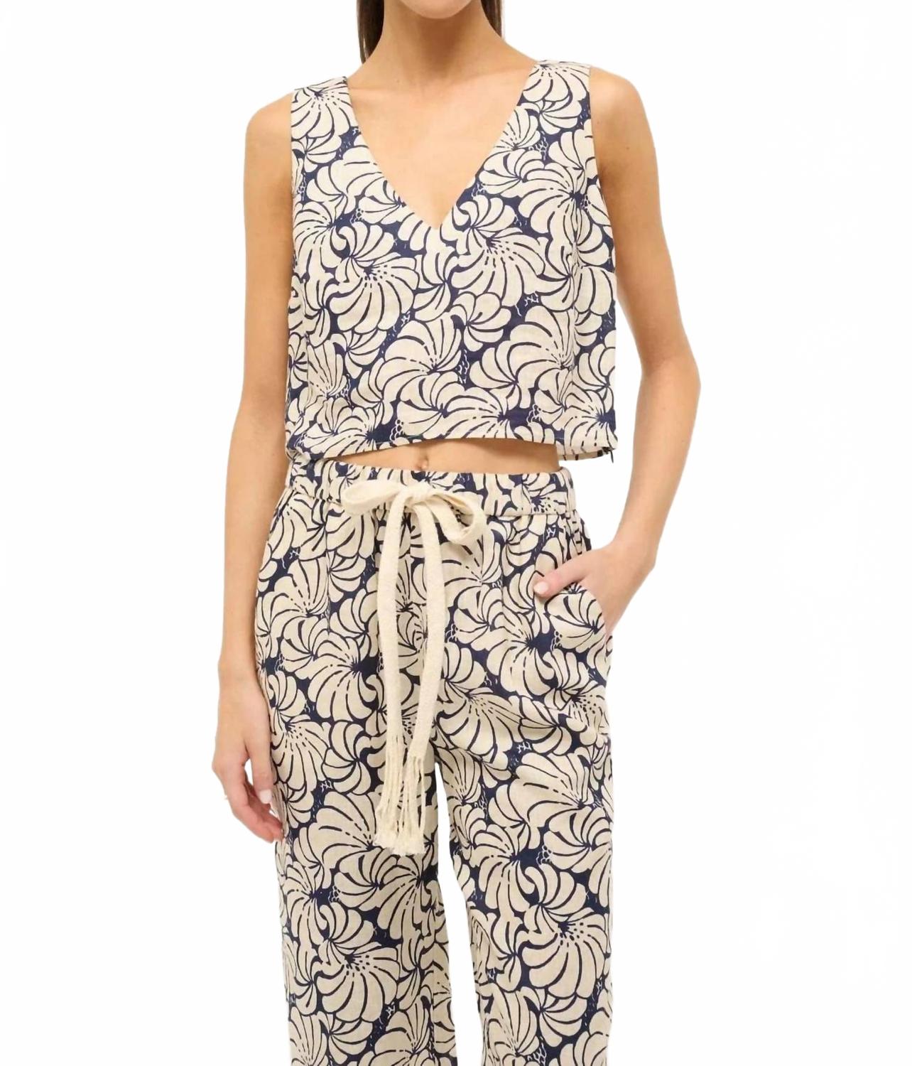 

Топ Catania в синем цвете с волнообразным краем и блочным принтом STAUD