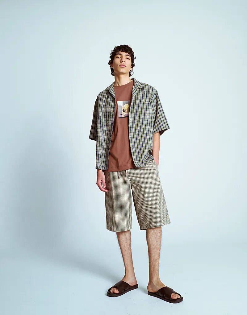 

Зеленые шорты в клетку из марли Topman jort