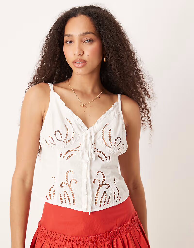 

Топ-комбинезон Free People с люверсами белого цвета