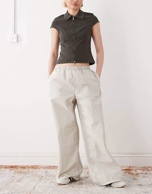 

Светло-бежевые брюки оверсайз с кулиской Weekday