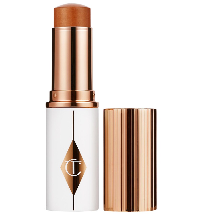 

Увлажняющий тональный крем-стик Unreal Skin Sheer Glow Tint Charlotte Tilbury, 0.3 oz /9 g, 12.5 Tan