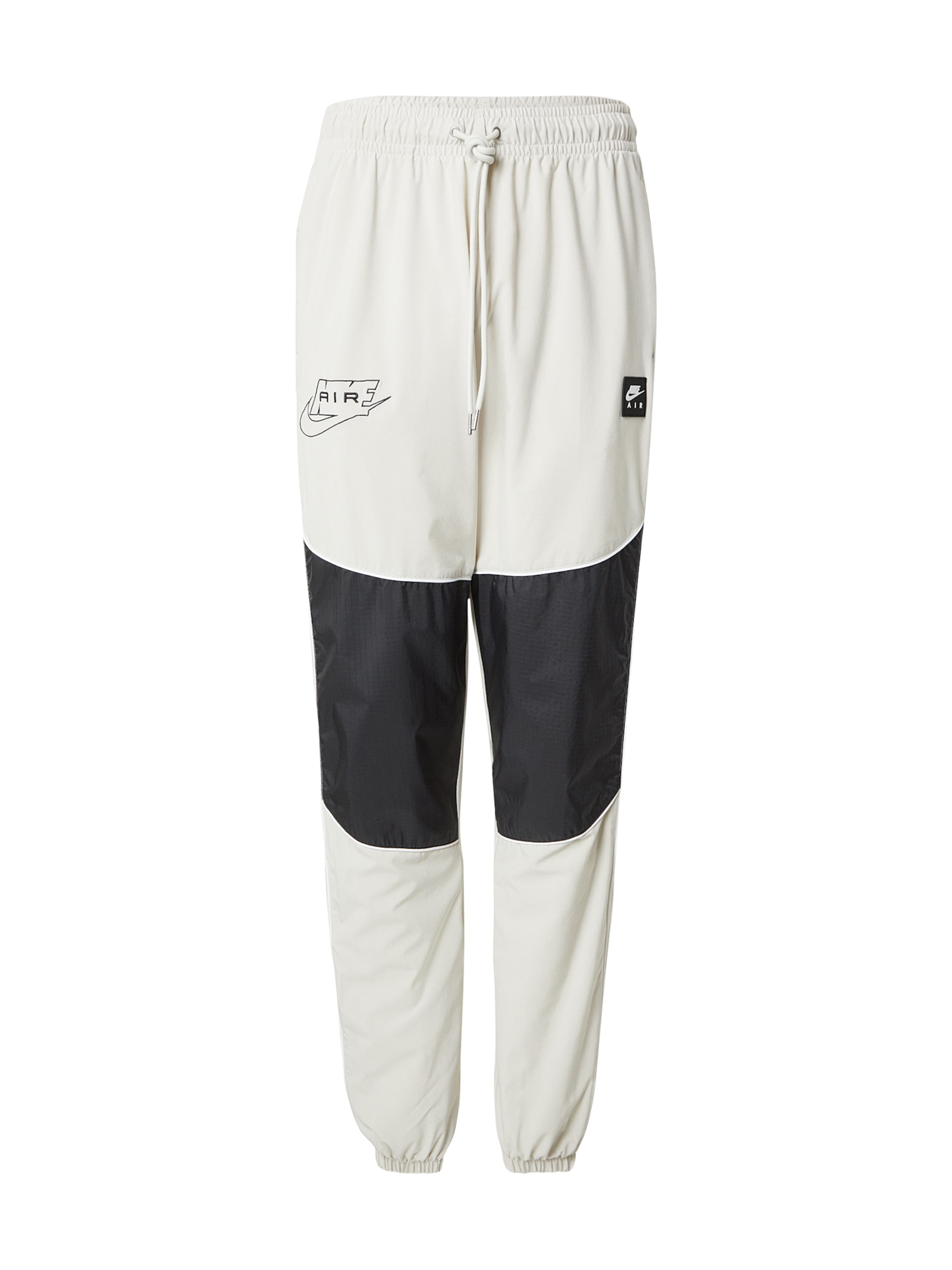 

Nike Sportswear Брюки зауженные 'AIR' в цвете Graphite, Light Grey
