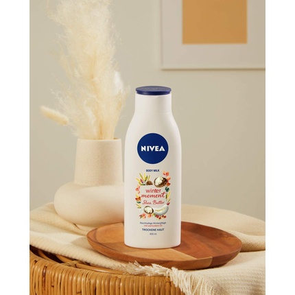 NIVEA Winter Moment Body Milk 400 мл Насыщенный лосьон для тела для сухой кожи - 48 часов увлажнения — фото 3