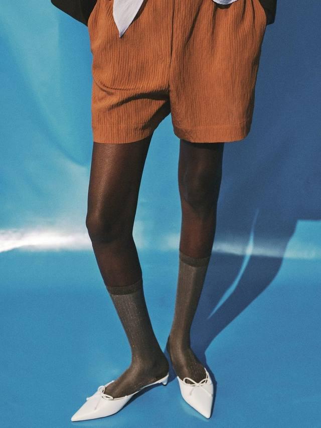 

Кокосовые шорты с текстурным контрастным тримом Mango