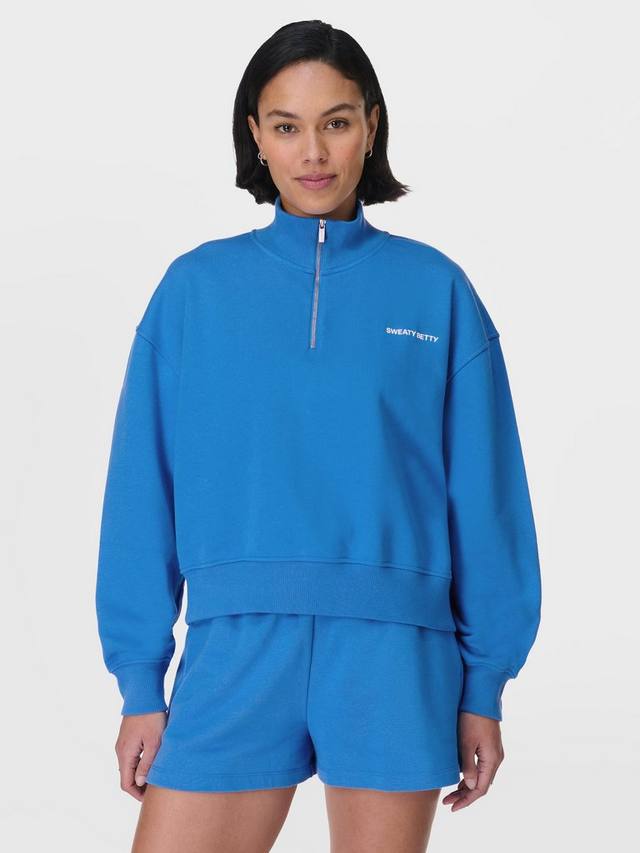 

Джемпер на молнии revive crop 1/2 Sweaty Betty, цвет Tidal Blue