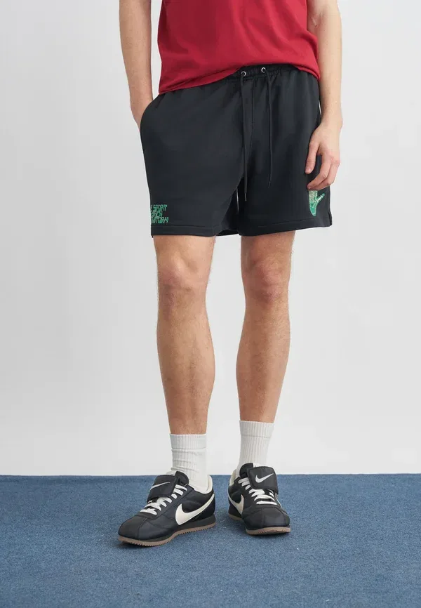 Спортивные штаны Nike Sportswear Club Flow, черный/малахитовый