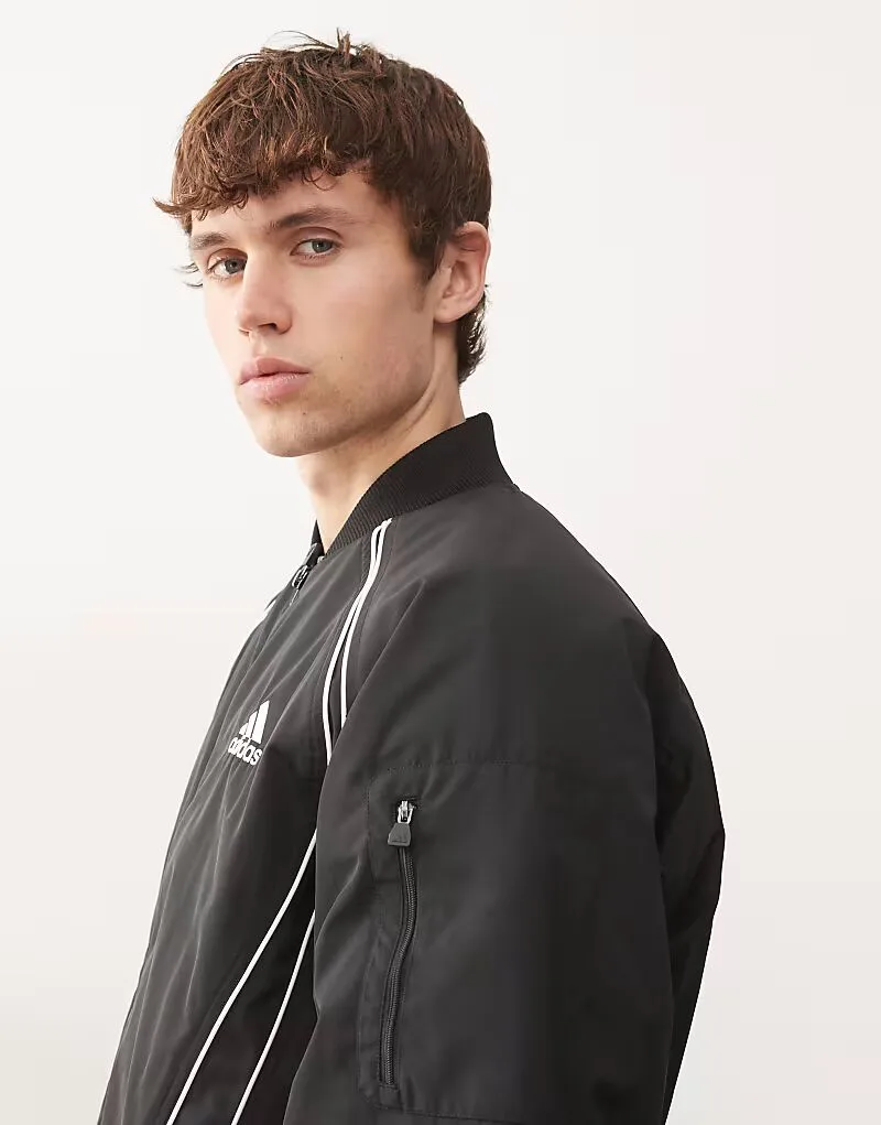 Черная дутая куртка Adidas Originals Teamgeist — фото 4