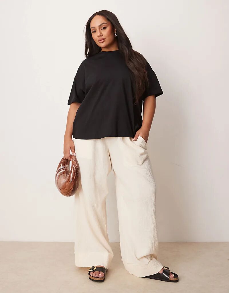 

Брюки-клеш ASOS DESIGN Curve из марли с необработанным краем цвета пахты