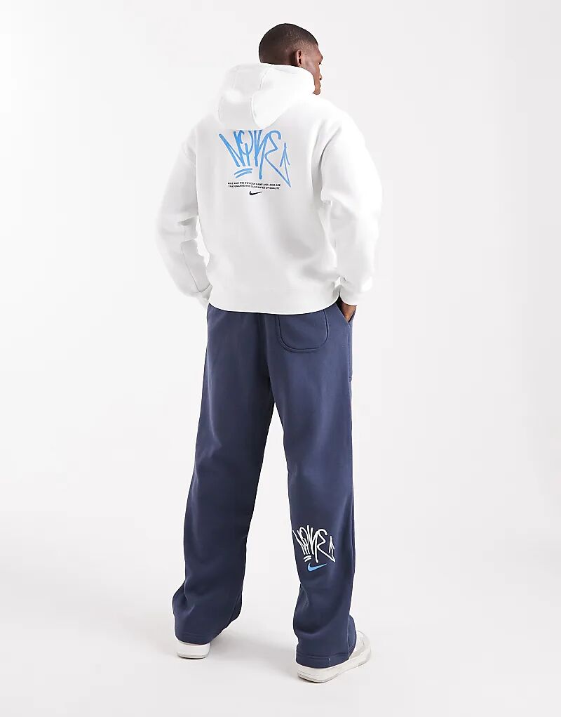 

Зауженные книзу флисовые брюки Nike Street темно-синего цвета