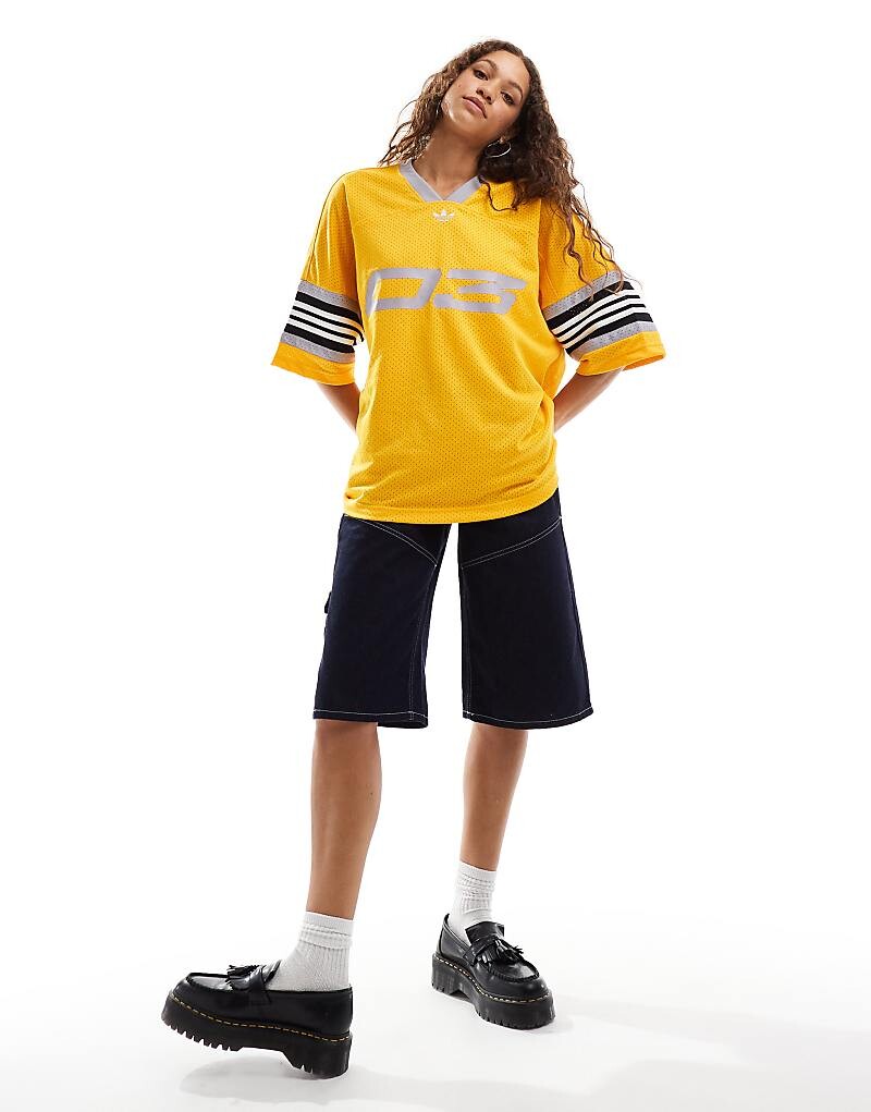 

Желтая баскетбольная футболка adidas Originals
