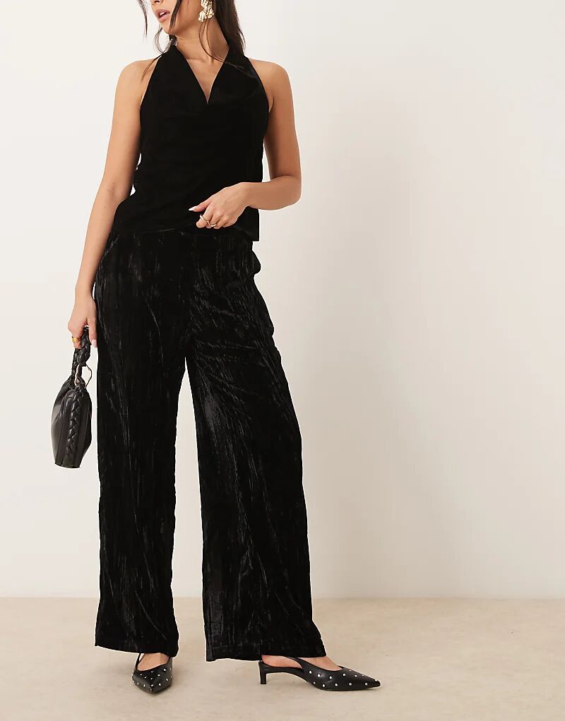 

Брюки из жатого бархата черного цвета ASOS DESIGN