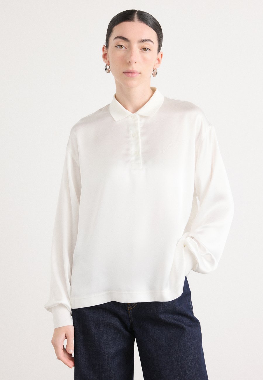 

Топ Lacoste Long sleeved top, Flour/Off-White