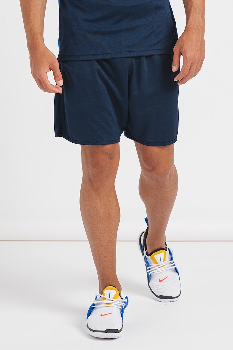

Спортивные брюки Dri-FIT со скошенными карманами Nike, синий