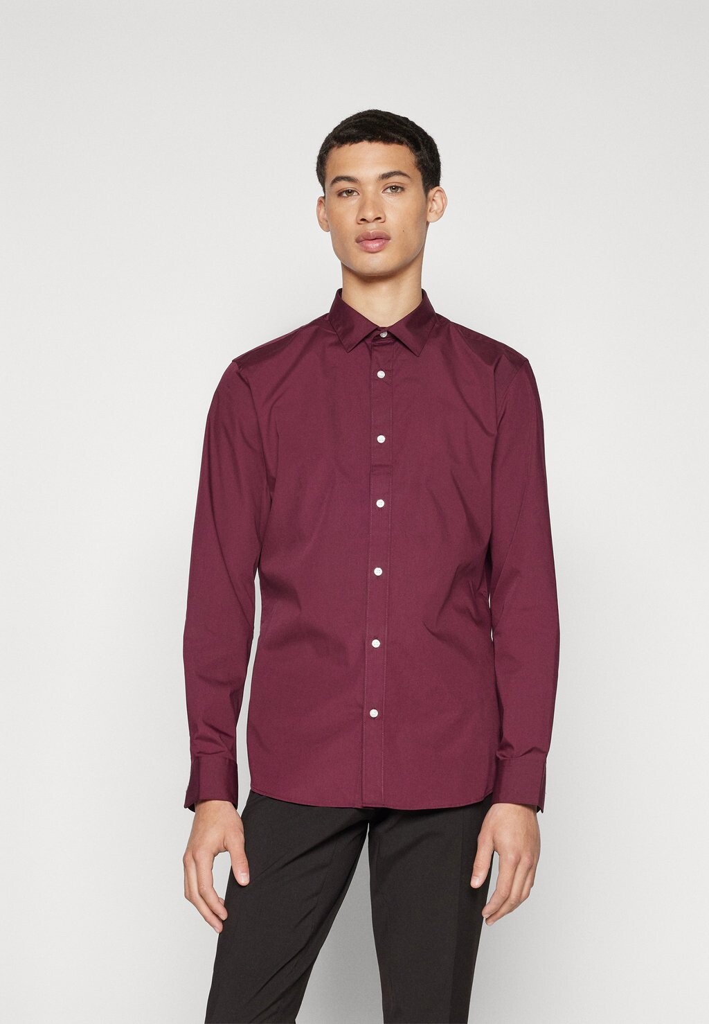 

Официальная рубашка JJJOE SHIRT PLAIN Jack & Jones, темно-красный