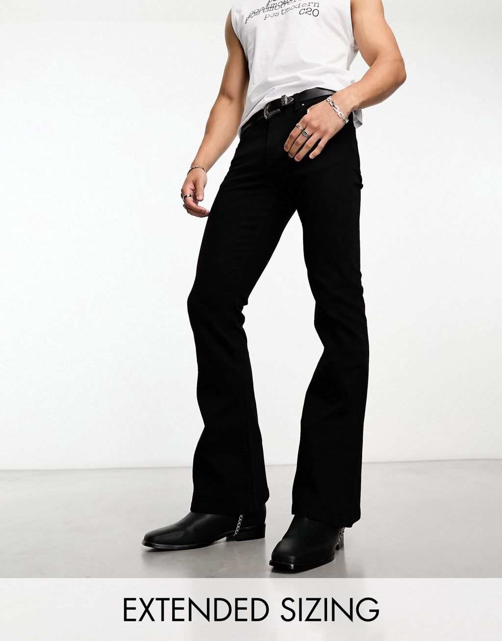 

Черные расклешенные джинсы стрейч ASOS DESIGN
