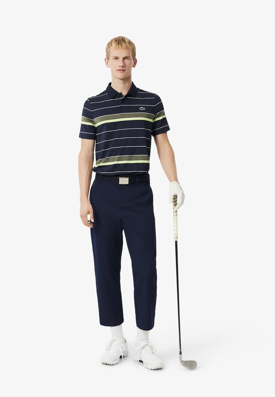 Поло Lacoste Polo shirt, Bleu Marine Vert Kaki Jaune Fluo-Ai/Dark Blue — фото 2