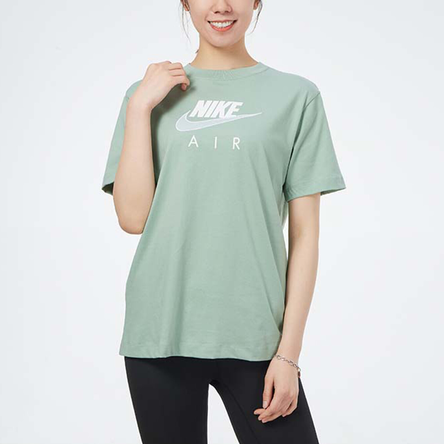 Футболка женская изумрудная Nike — фото 3
