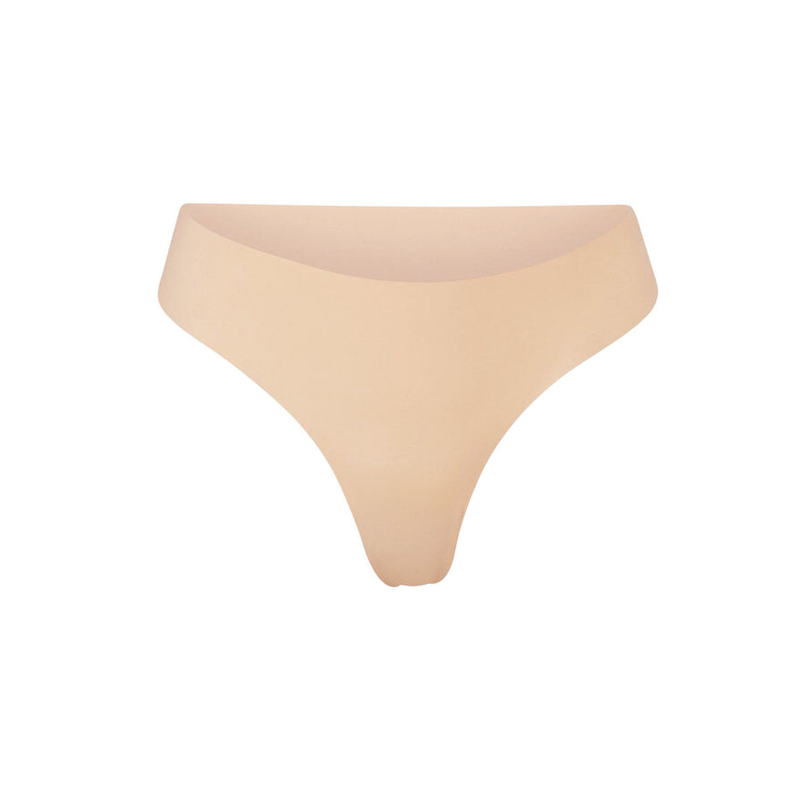 

Стринги с окучиванием SKIMS Naked, цвет Clay