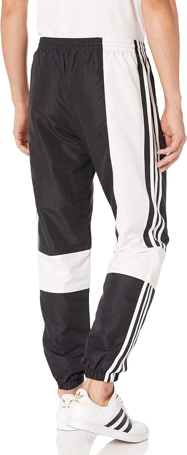 Мужские спортивные брюки adidas Originals Asymm свободного кроя — фото 2