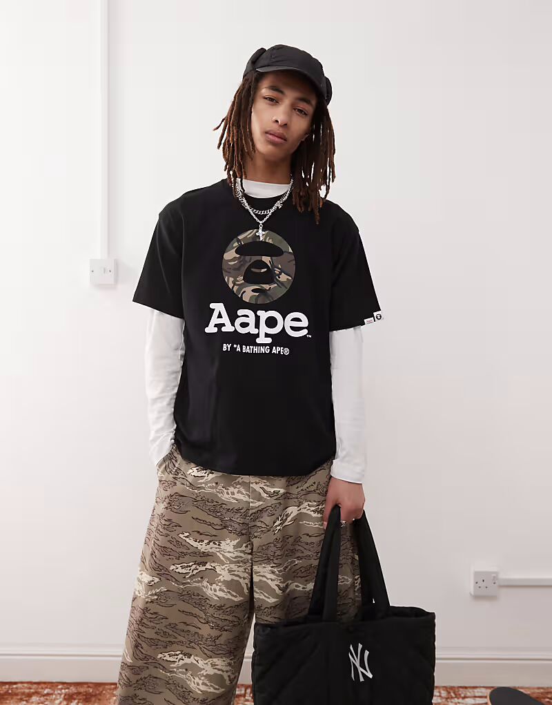 

Футболка камуфляжного цвета с логотипом Aape by A Bathing Ape черного цвета AAPE BY A BATHING APE