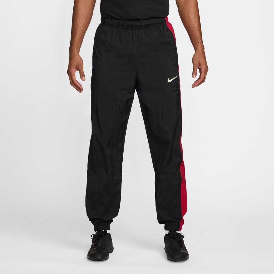 Зауженные спортивные брюки NIKE Total 90, черный — фото 3