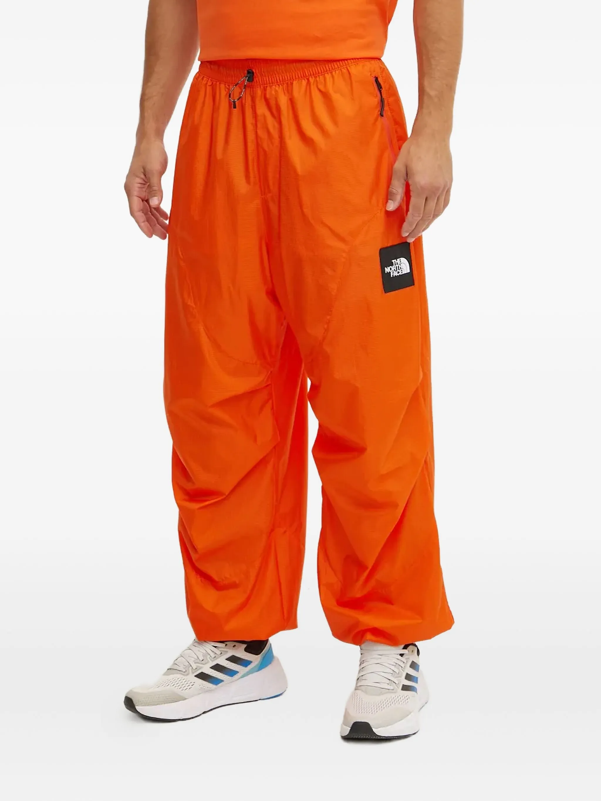 

Спортивные брюки с кулиской из коллаборации с Yinka Ilori The North Face, оранжевый