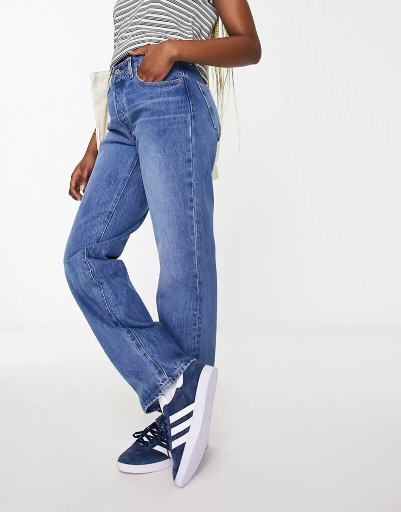 

Выстиранные джинсы 90-х годов Levi's 501 темно-синего цвета