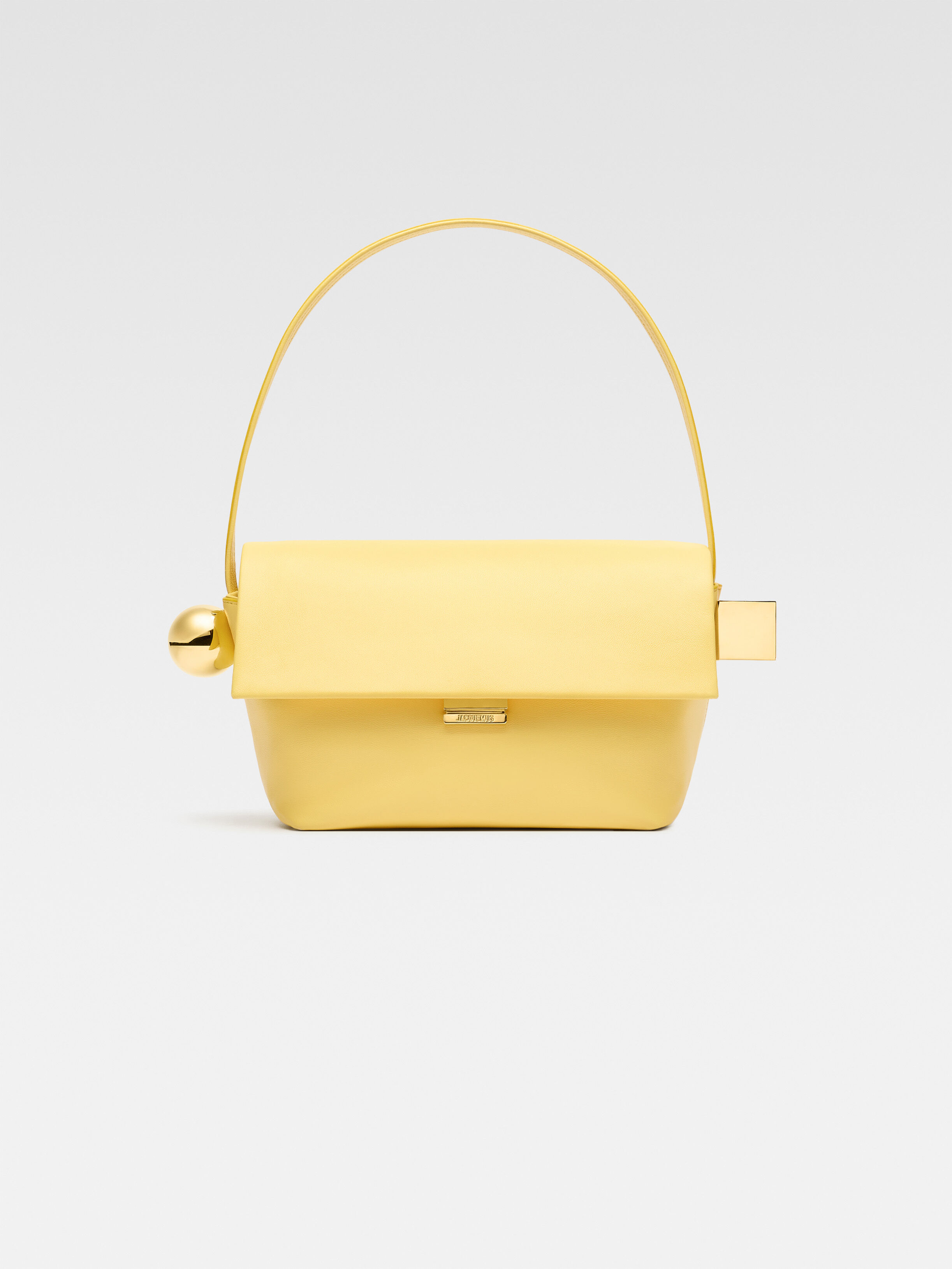 

Сумка через плечо с клапаном JACQUEMUS The Rond Carré, светло-желтый