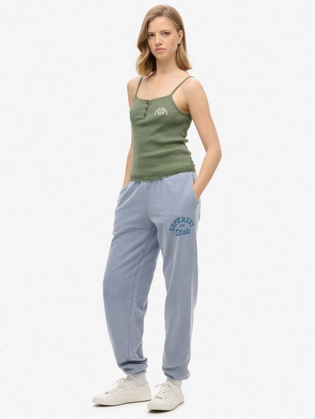 

Винтажные джоггеры с потертым принтом Superdry, Tidal Blue