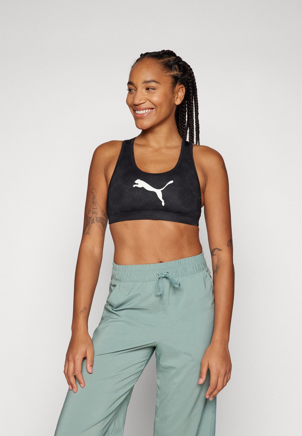 

Спортивный бюстгальтер средней поддержки BRA Puma, черный