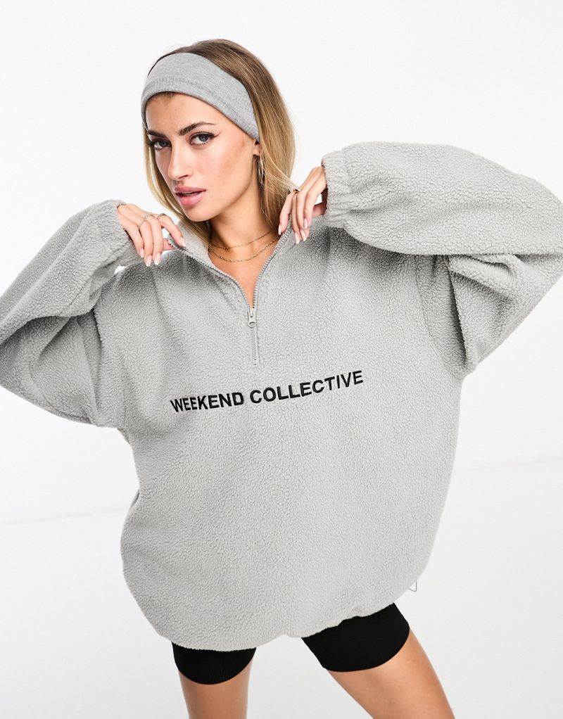 

Флис серого вереска с полумолнией и логотипом борга ASOS DESIGN Weekend Collective ASOS