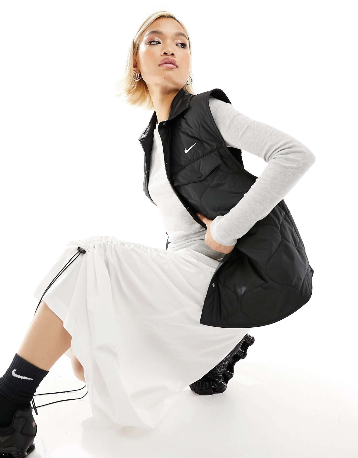

Черный стеганый жилет Nike Essential