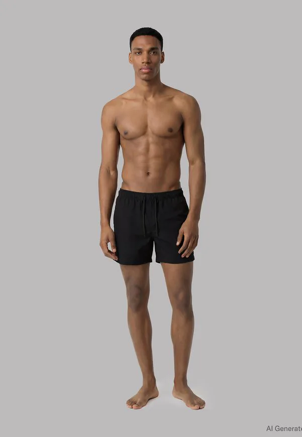 Плавки с завязками - незаменимый элемент гардероба. Calvin Klein Swimwear, Black — фото 2
