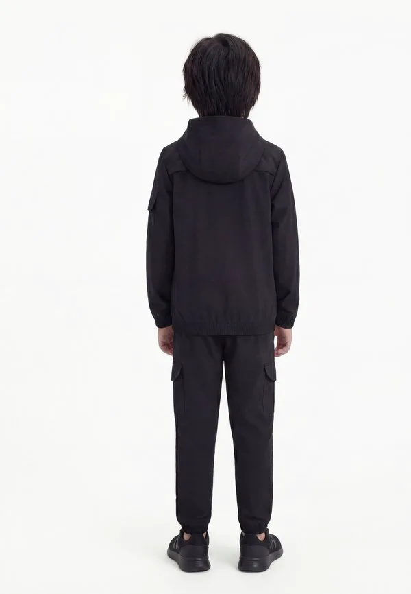Детский спортивный костюм, куртка для тренировок унисекс Adidas Performance, Black/White — фото 2