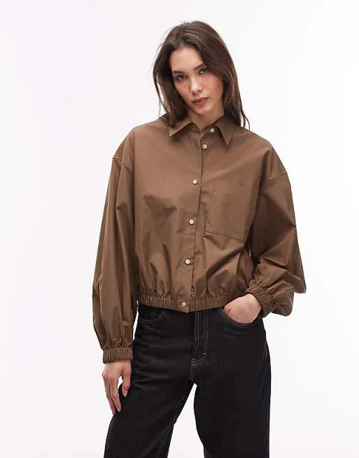 

Коричневая рубашка с объемным подолом ARKET