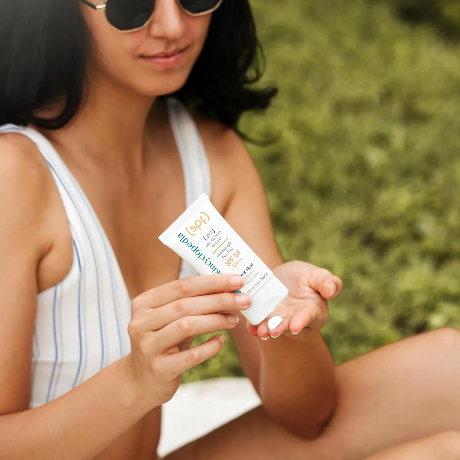 Солнцезащитный флюид для лица SPF 50 с ниацинамидом и чайным деревом от Skincyclopedia Skincyclopedia — фото 3