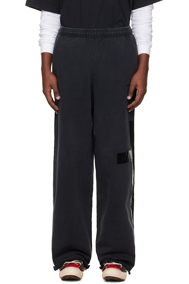 

Заклеенные скотчем спортивные штаны Vetements, черный