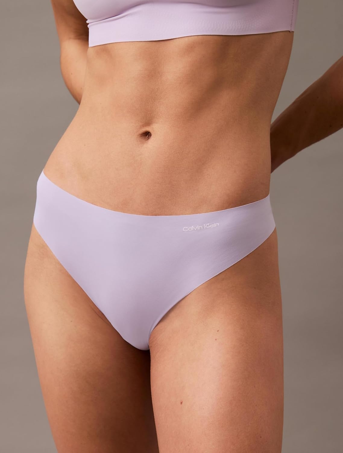 Женские бесшовные трусики-стринги Calvin Klein Invisibles, 3 шт., Black/Cinder/Lilac Quartz — фото 4