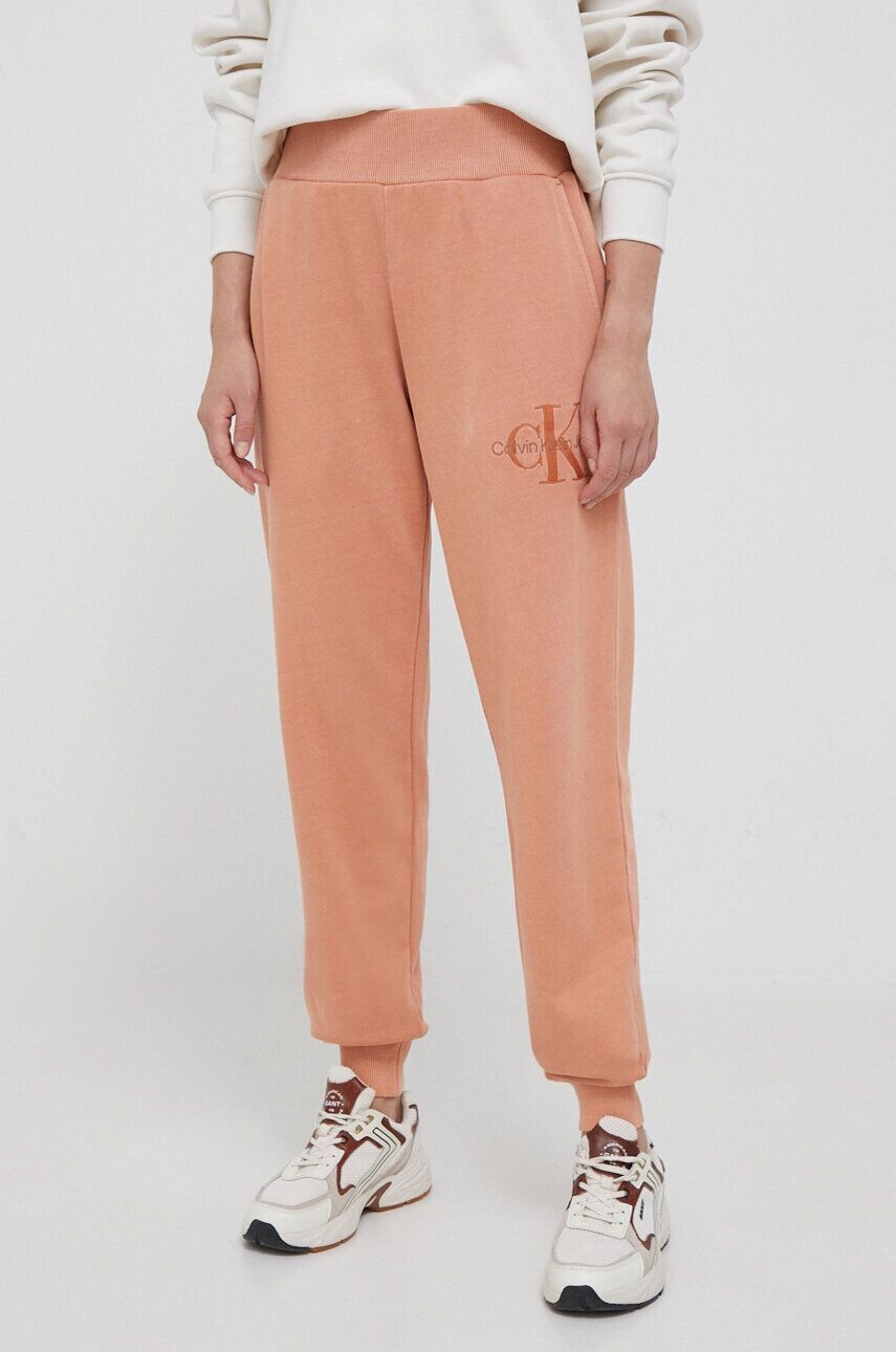 

Спортивные брюки из хлопка Calvin Klein Jeans, оранжевый